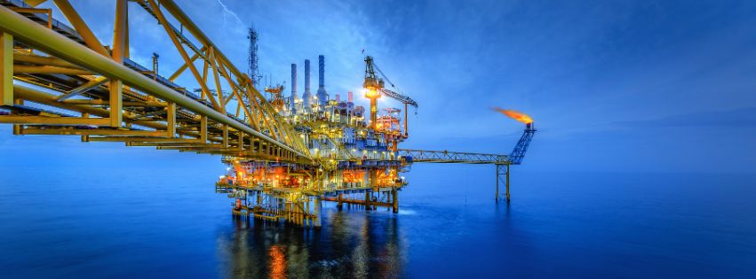 Oil rig in ocean.
