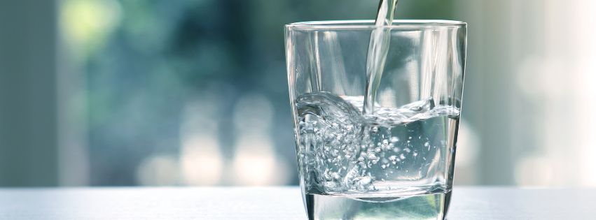 Water being poured in a glass.